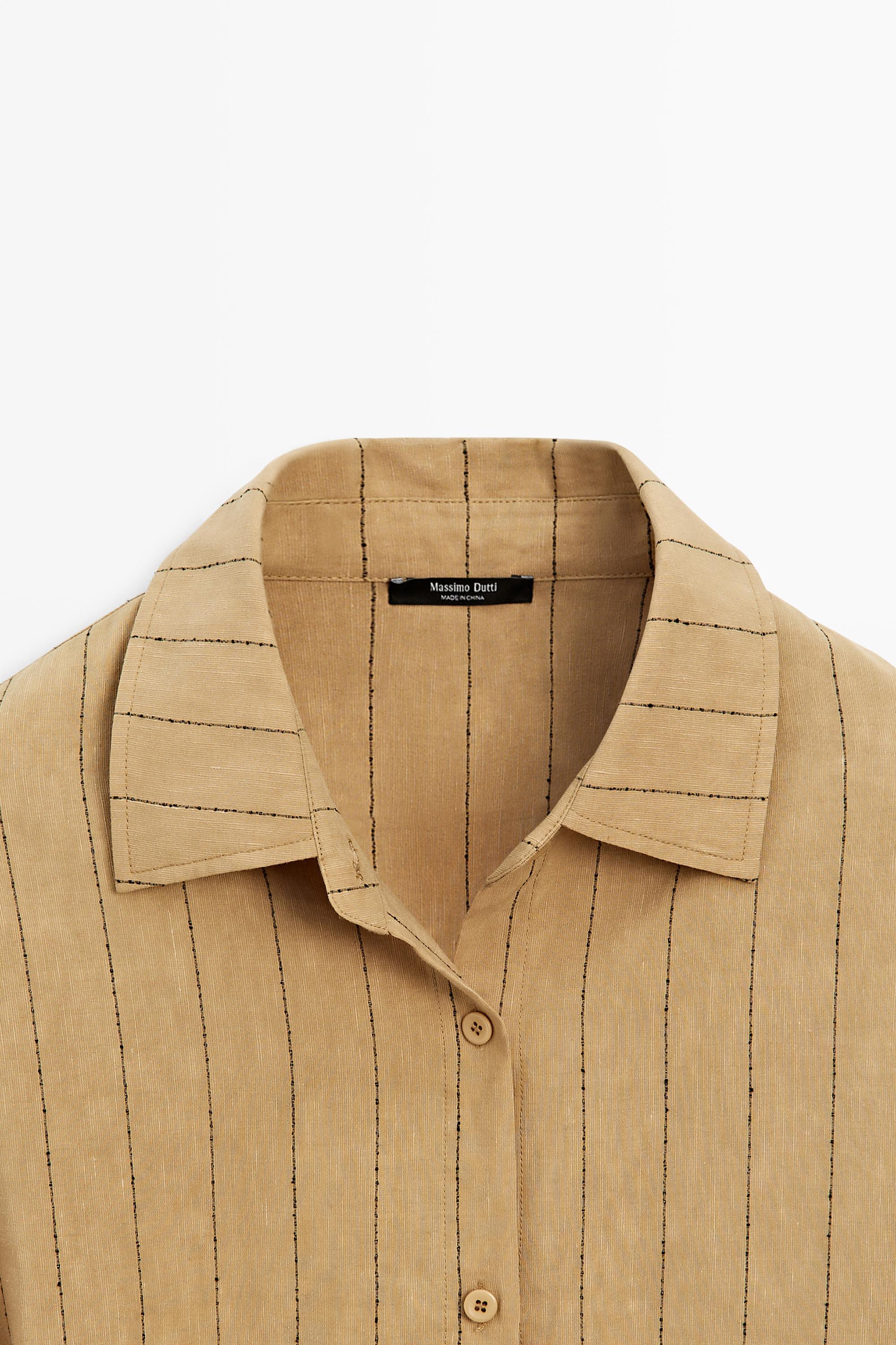 Striped flowing shirt with corset belt detail
